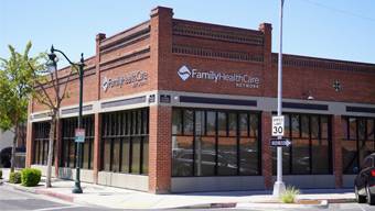 Exterior view of the corporate office of Family Healthcare Network in Visalia, CA